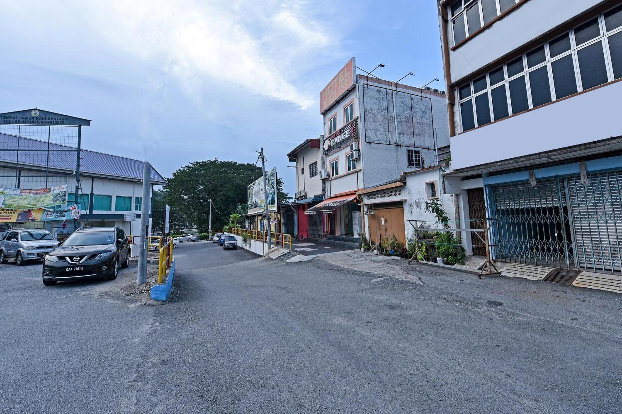 Super Oyo 992 Orange Hotel กัวลาปิลาห์ ภายนอก รูปภาพ