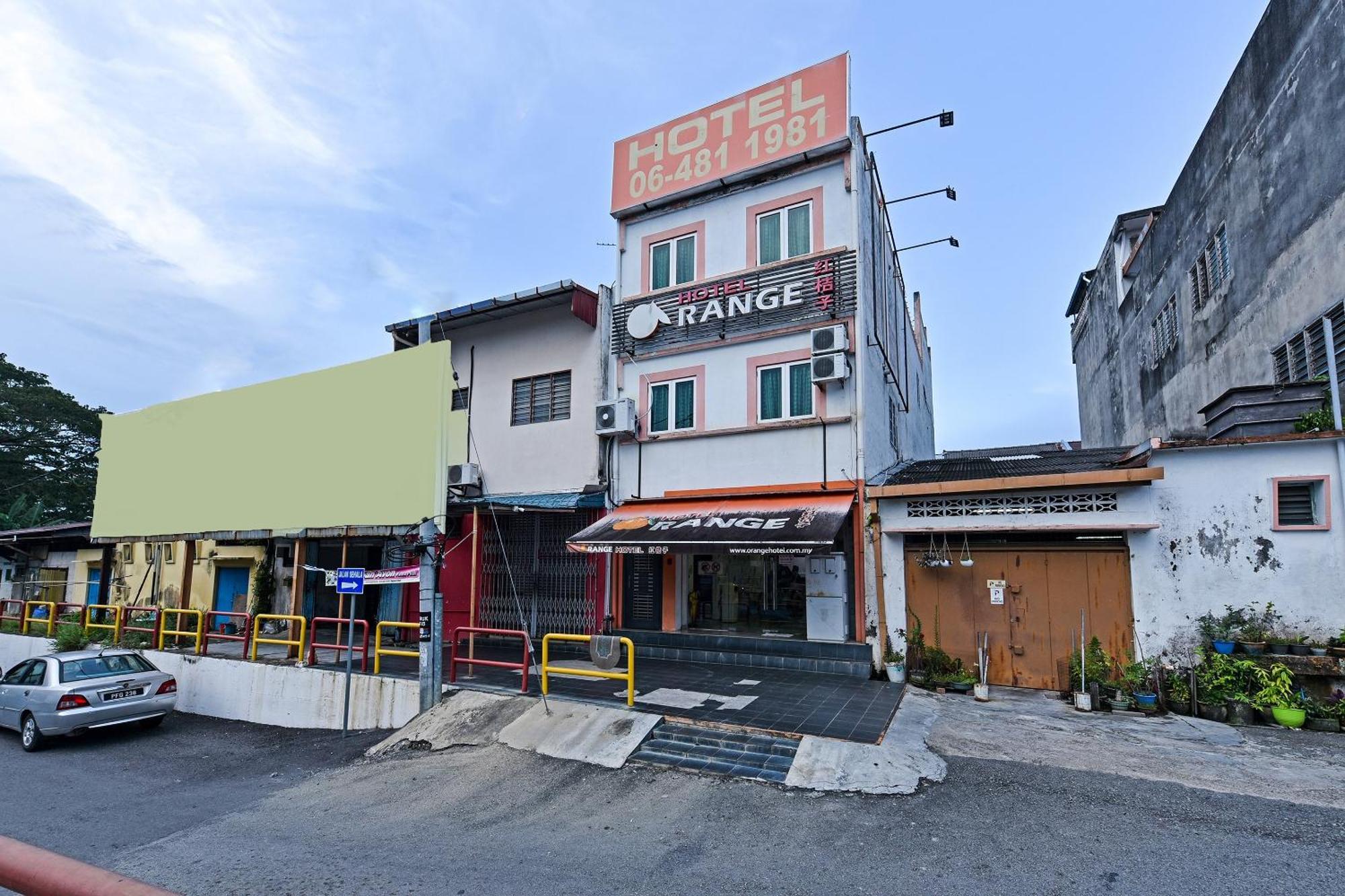 Super Oyo 992 Orange Hotel กัวลาปิลาห์ ภายนอก รูปภาพ