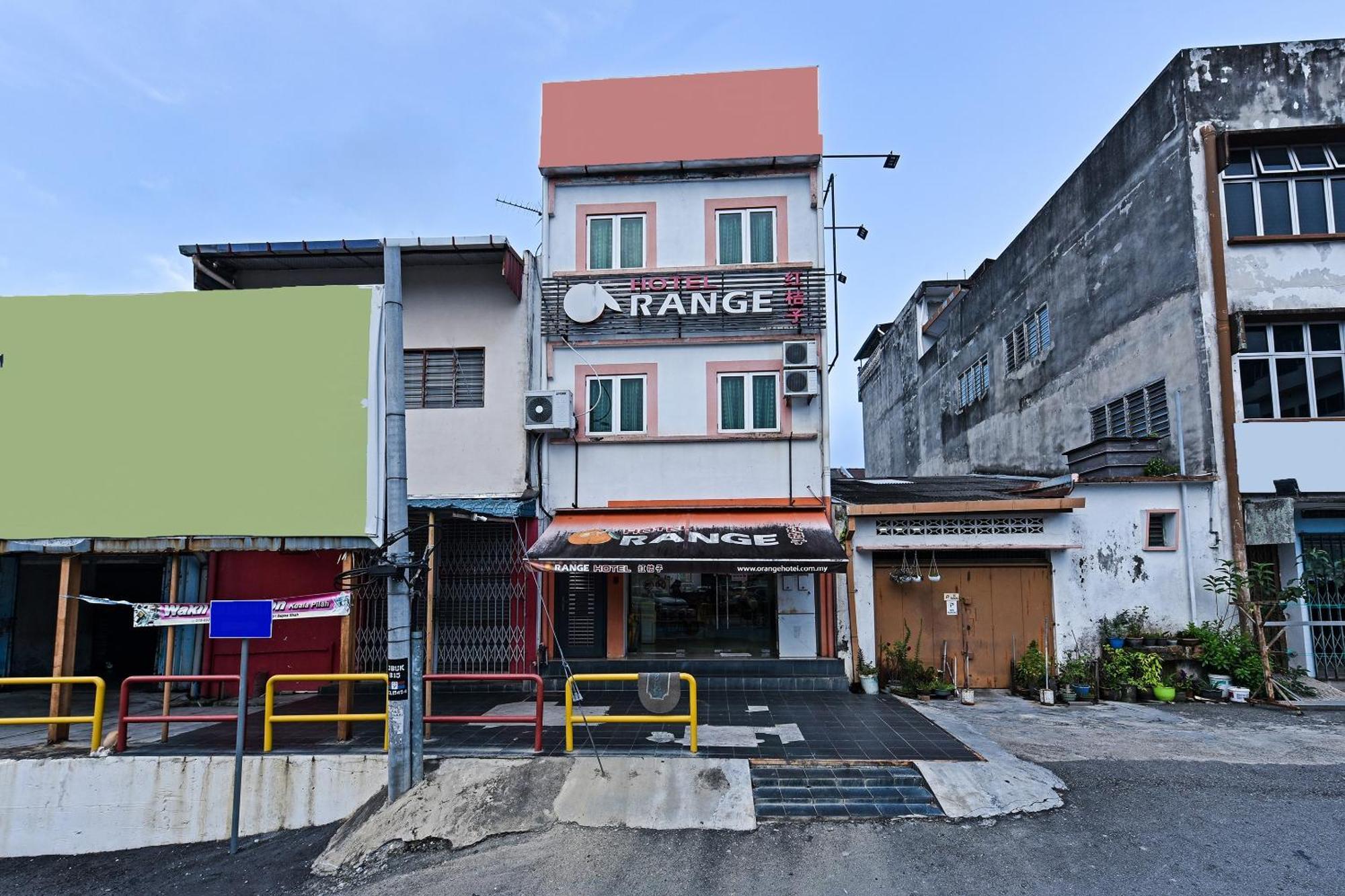 Super Oyo 992 Orange Hotel กัวลาปิลาห์ ภายนอก รูปภาพ